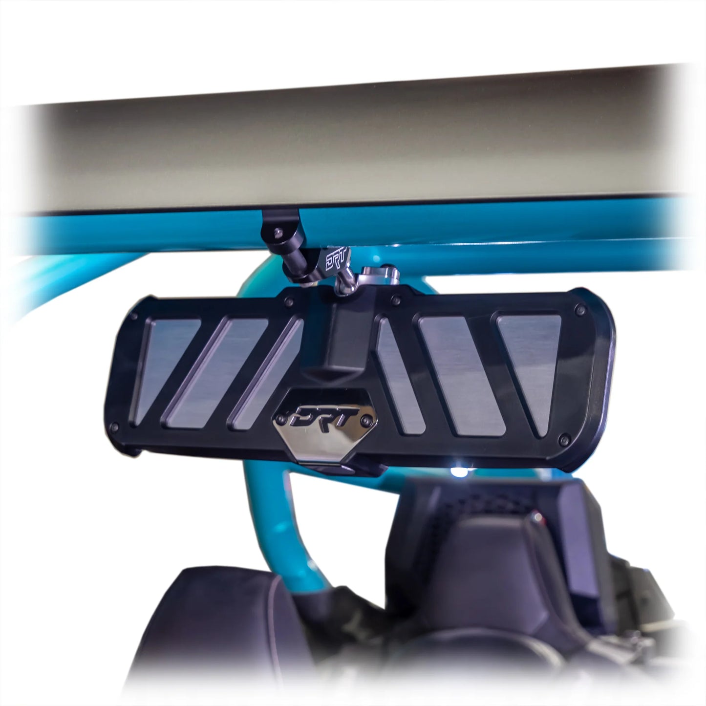 Close-up of a black metal footrest on a blue vehicle frame.