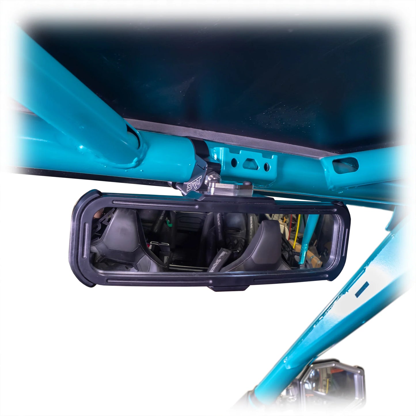 Close-up of a blue vehicle's undercarriage with a mirror attached.