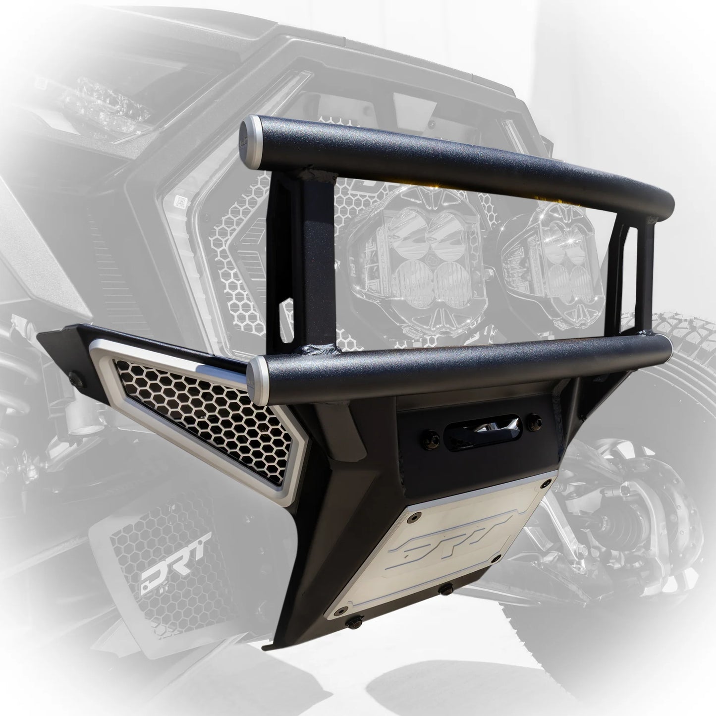 Black protective bumper on a vehicle with a blurred background