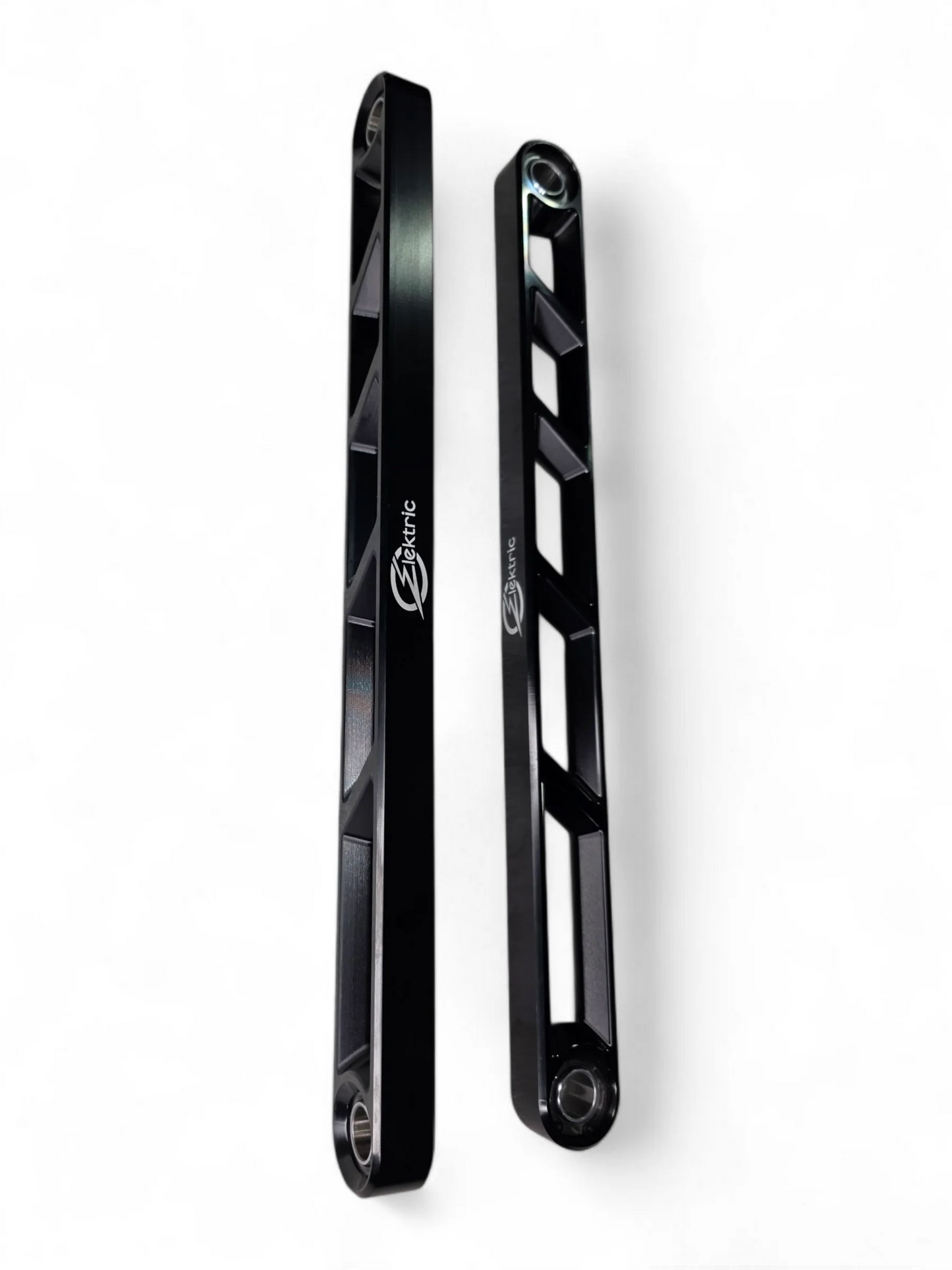 Two black metal brackets on a white background