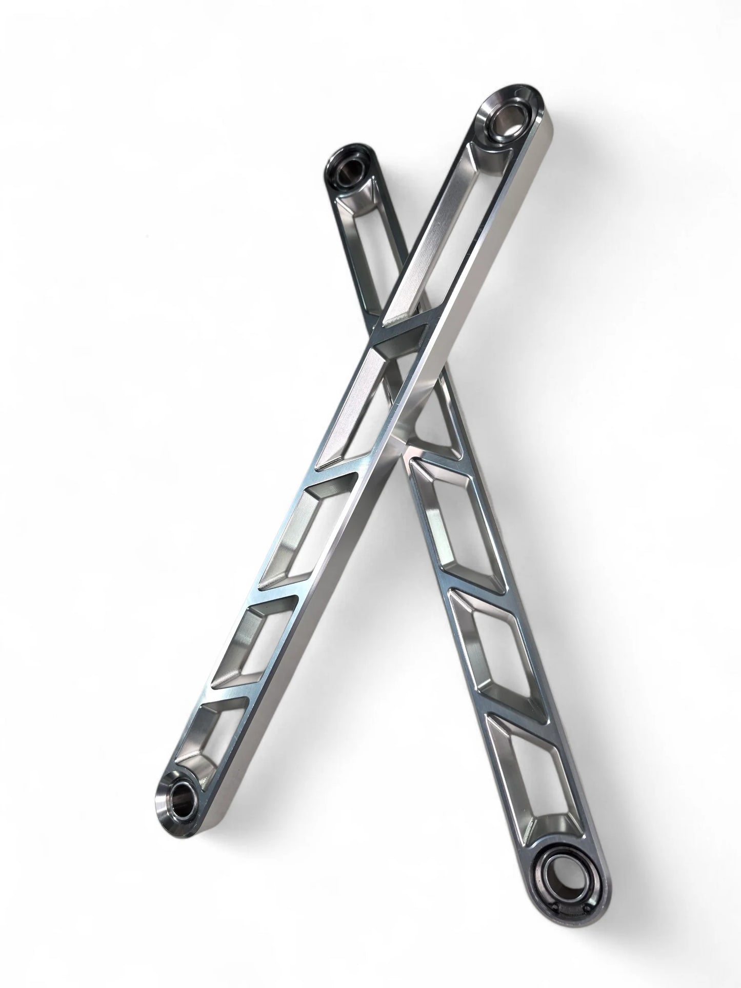 Elektric offroad Rear Sway Bar links crossed on white background