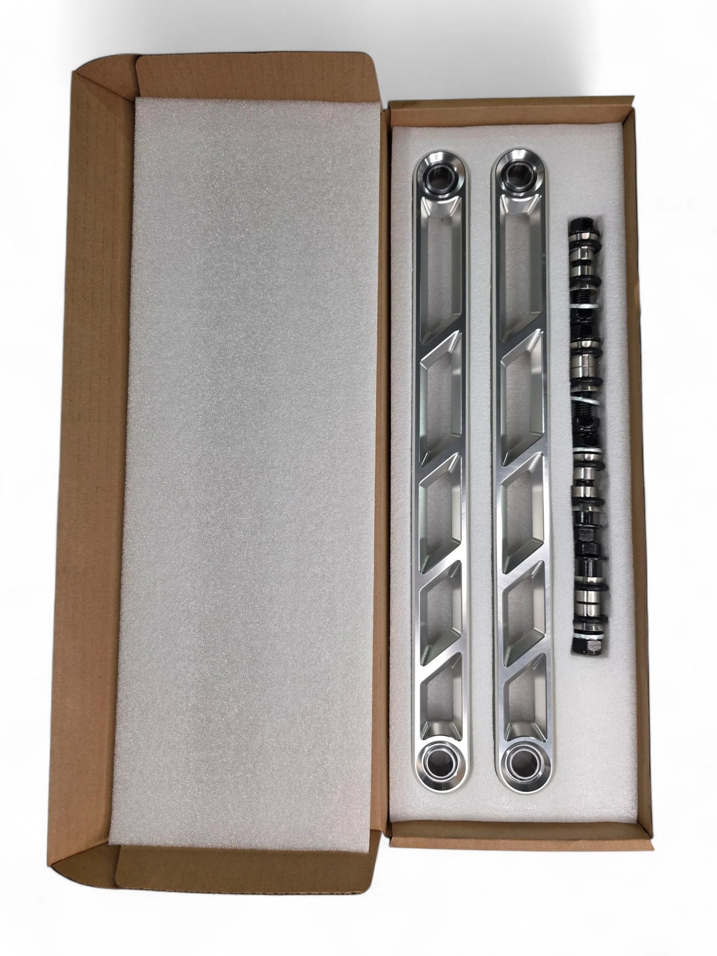 Elektric offroad Rear Sway Bar links with hardware on white background in box