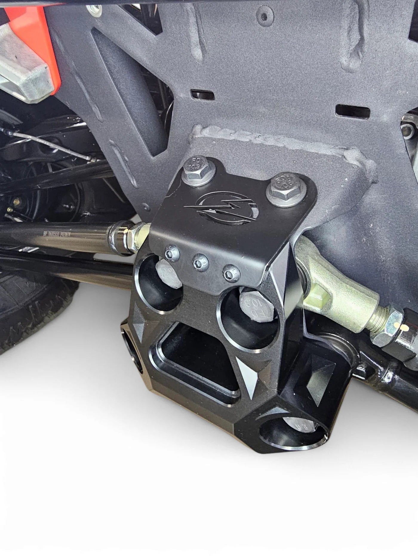Close-up of a mechanical component on a vehicle, likely a suspension or steering part.