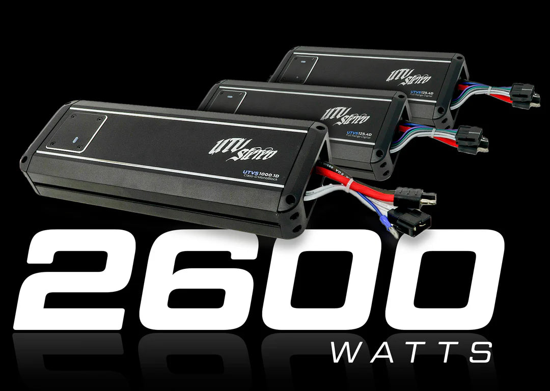 Three power amplifiers with 'Mega' branding and '2600 Watts' text on a black background.
