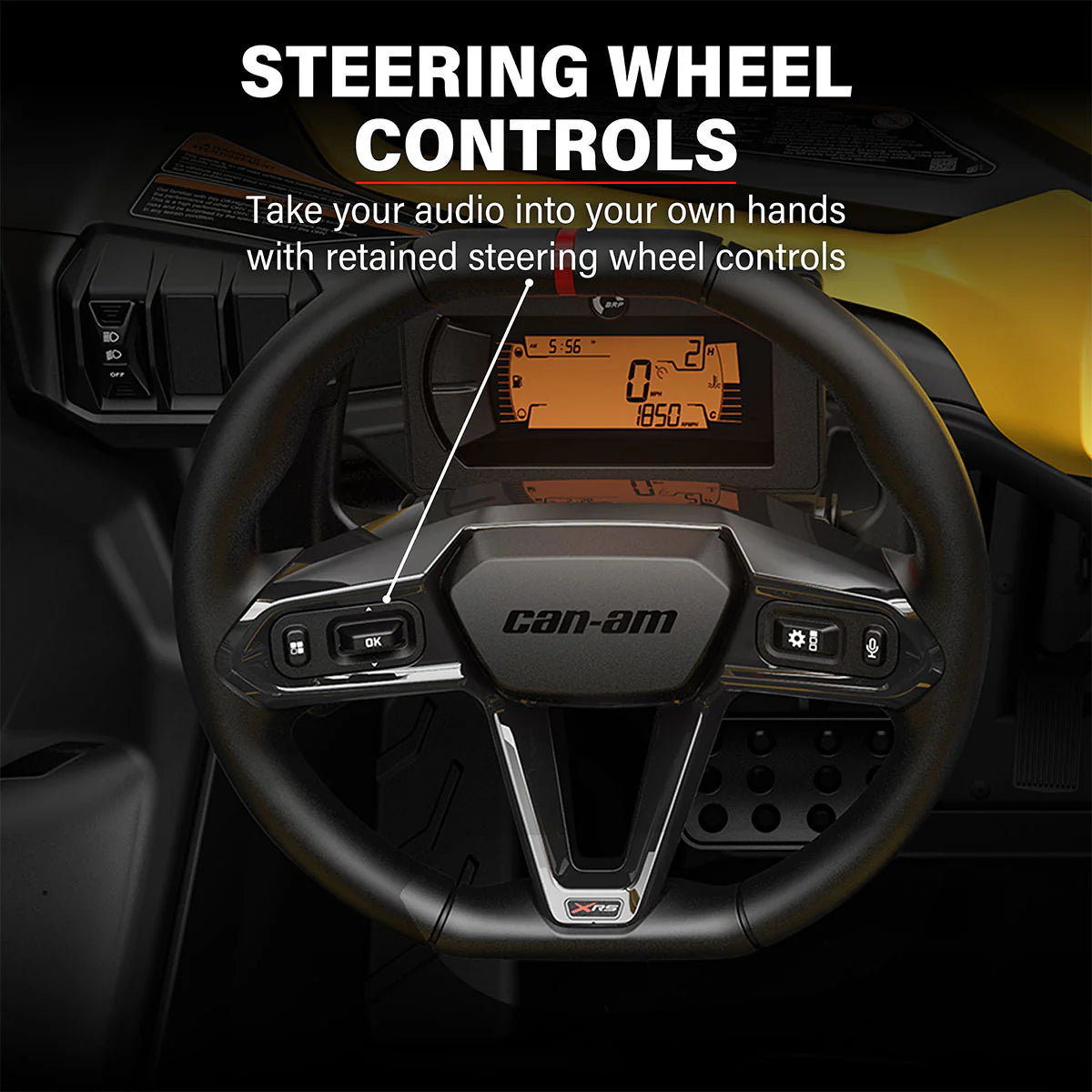 Steering wheel with retained audio controls in a vehicle interior, featuring the Can-Am brand.