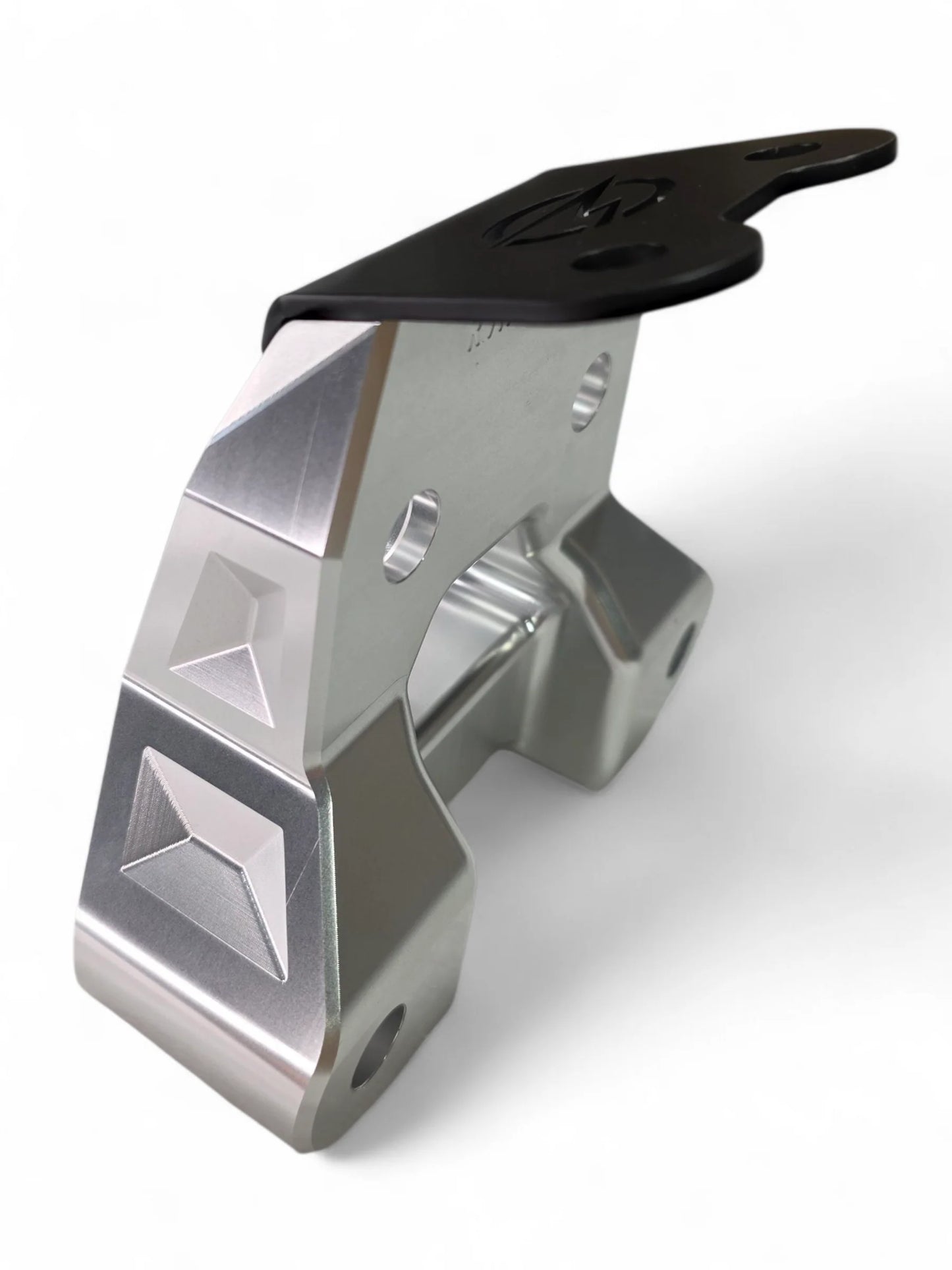 Metallic clamp with black handle on a white background