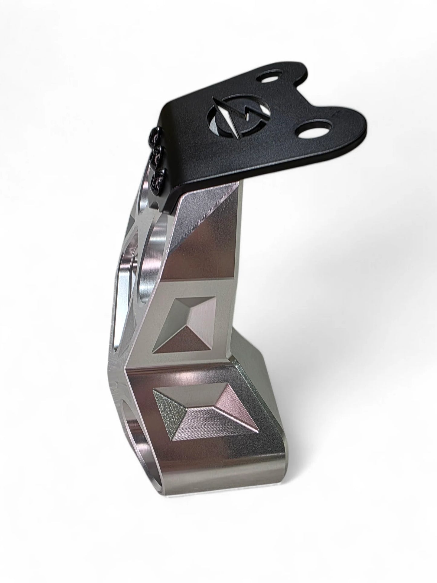 Metallic bracket with a black top section on a white background