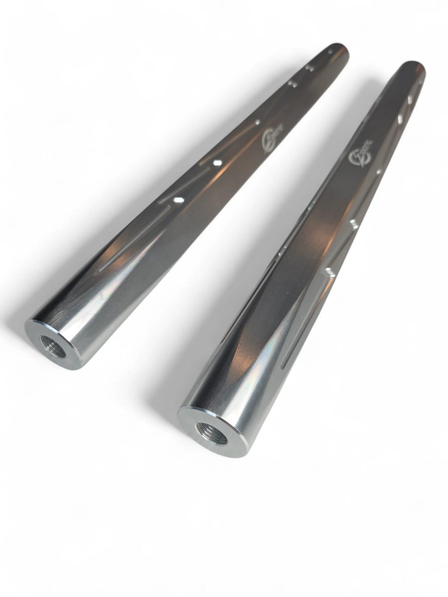 Two metallic objects on a white background