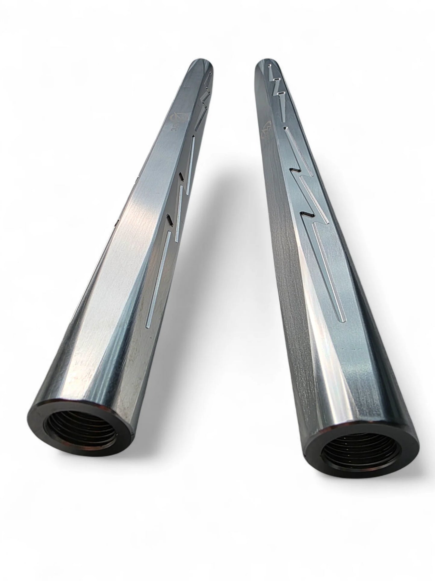 Two metallic Tie Rods on a white background