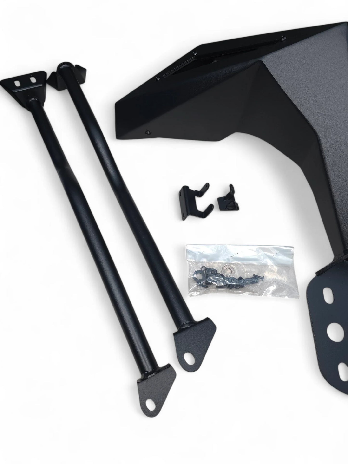 Black motorcycle fender and support structure on a white background