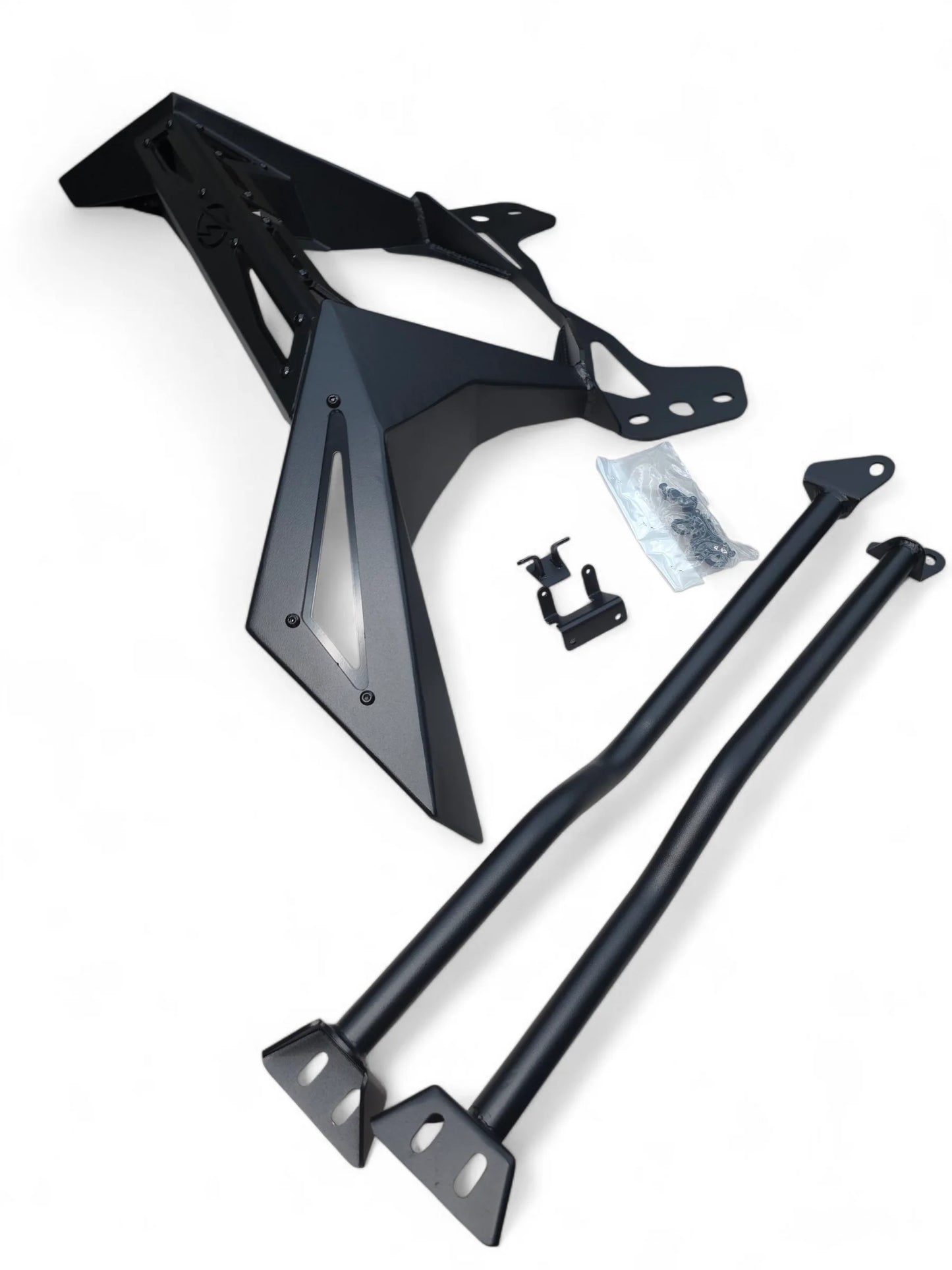 Black metal vehicle frame and components on a white background