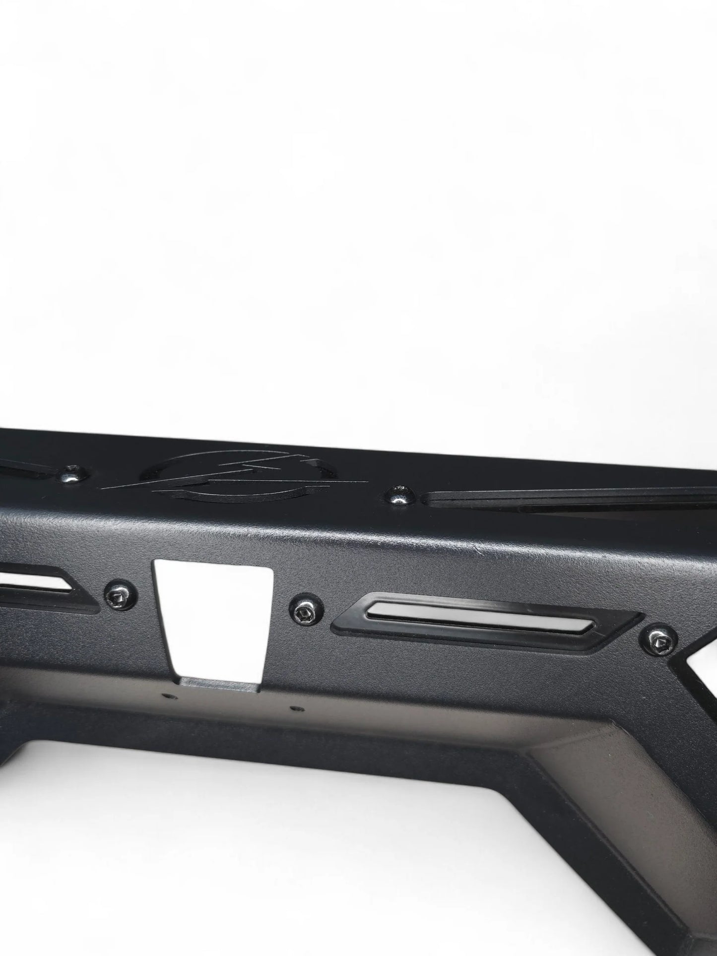 Black metal frame with cutouts on a white background