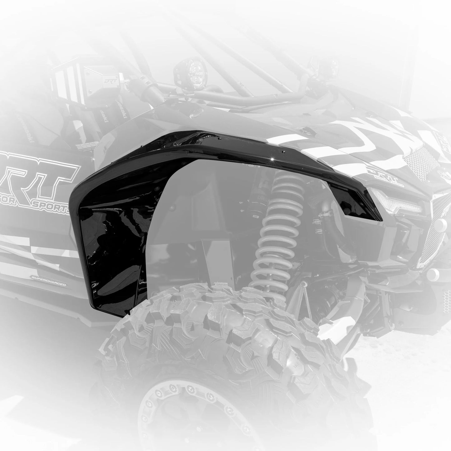 Black motorcycle windshield on a blurred background
