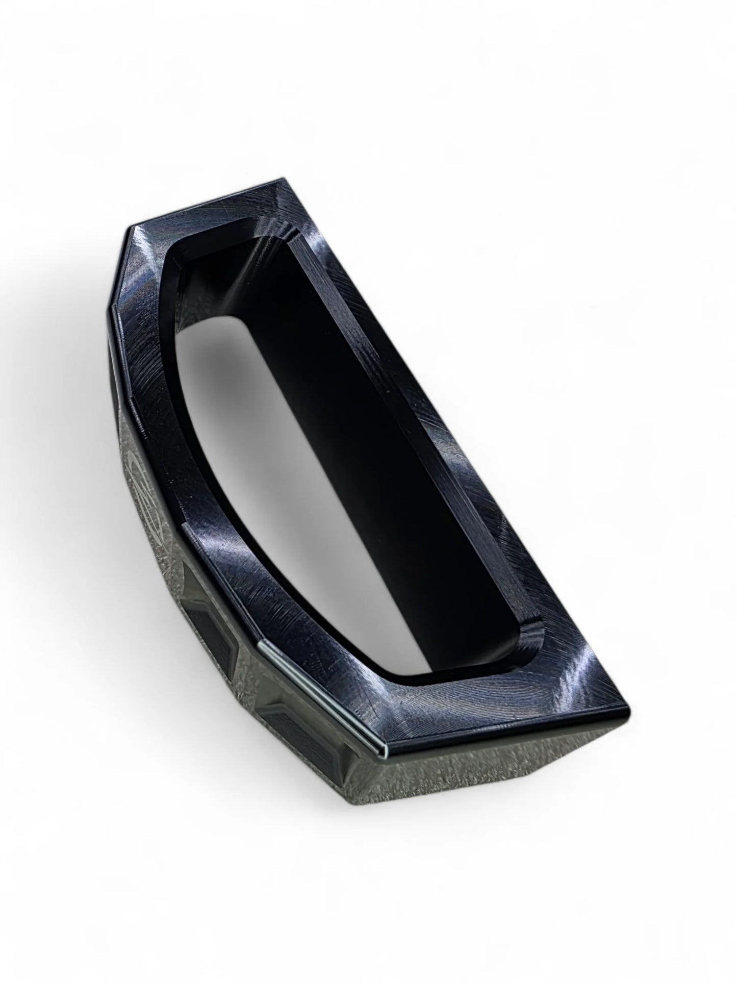 Black geometric object on a white background