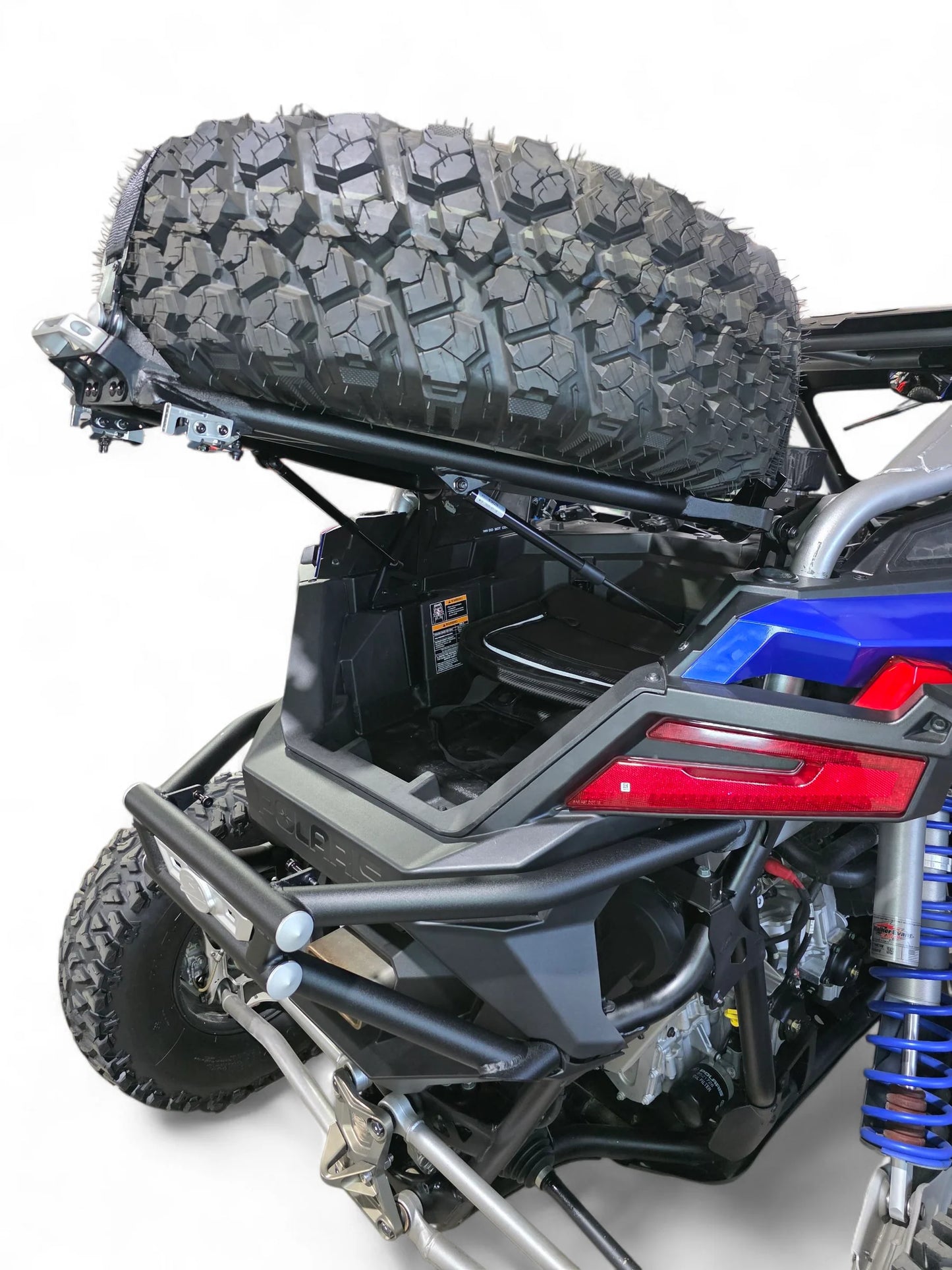 ATV with a spare tire mounted on the back