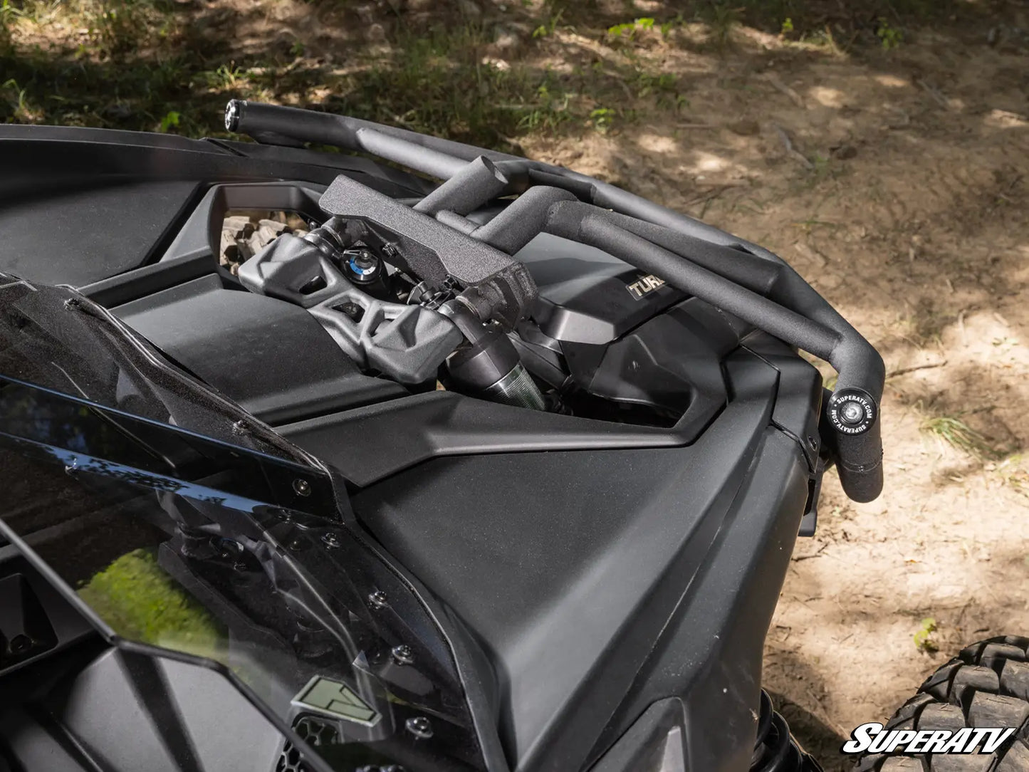 Close-up of a SuperATV product with a natural outdoor background