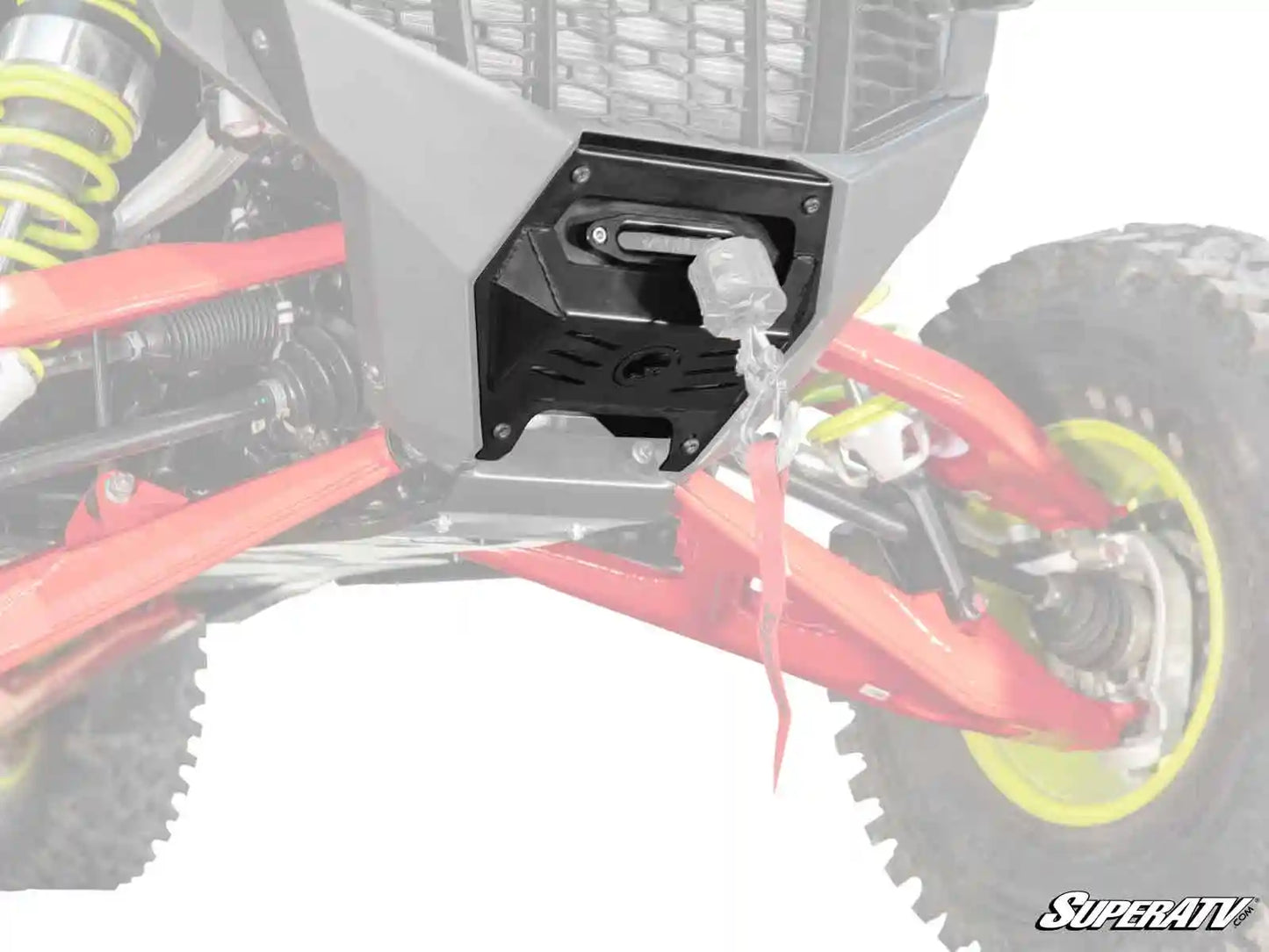 Close-up of an off-road vehicle suspension system with a SuperATV logo.
