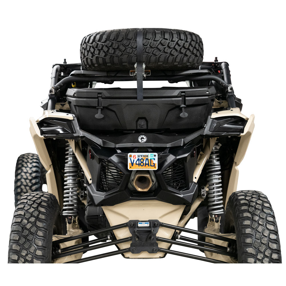 Front view of a four-wheeler with a spare tire on a white background