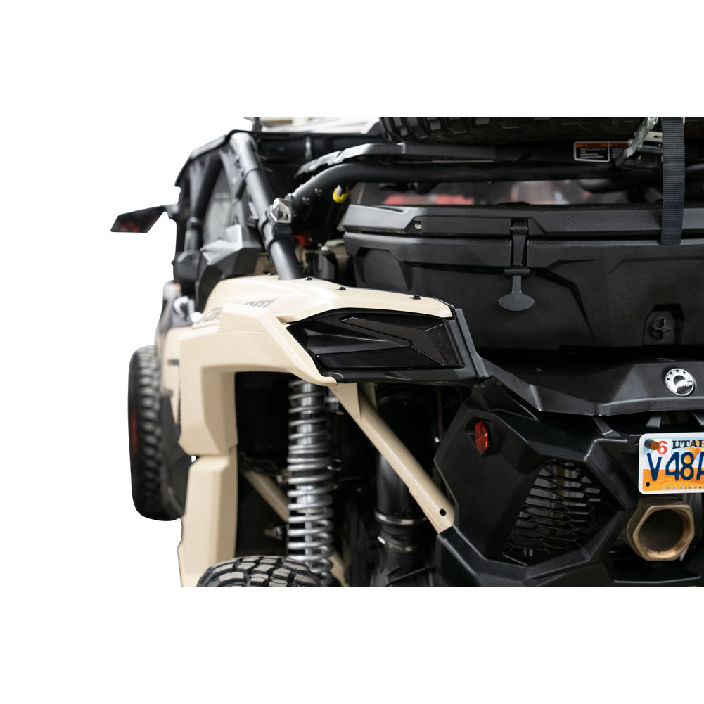 Close-up of a black off-road vehicle with a beige bumper on a white background