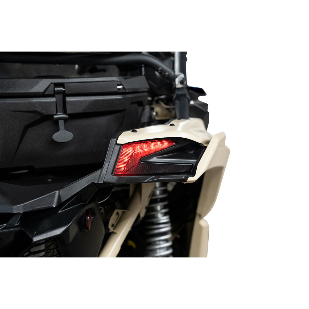 Side view of a vehicle with a red taillight on a white background