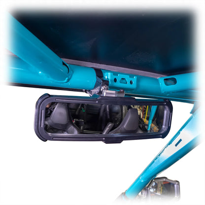 Close-up of a blue vehicle's undercarriage with a mirror attached.