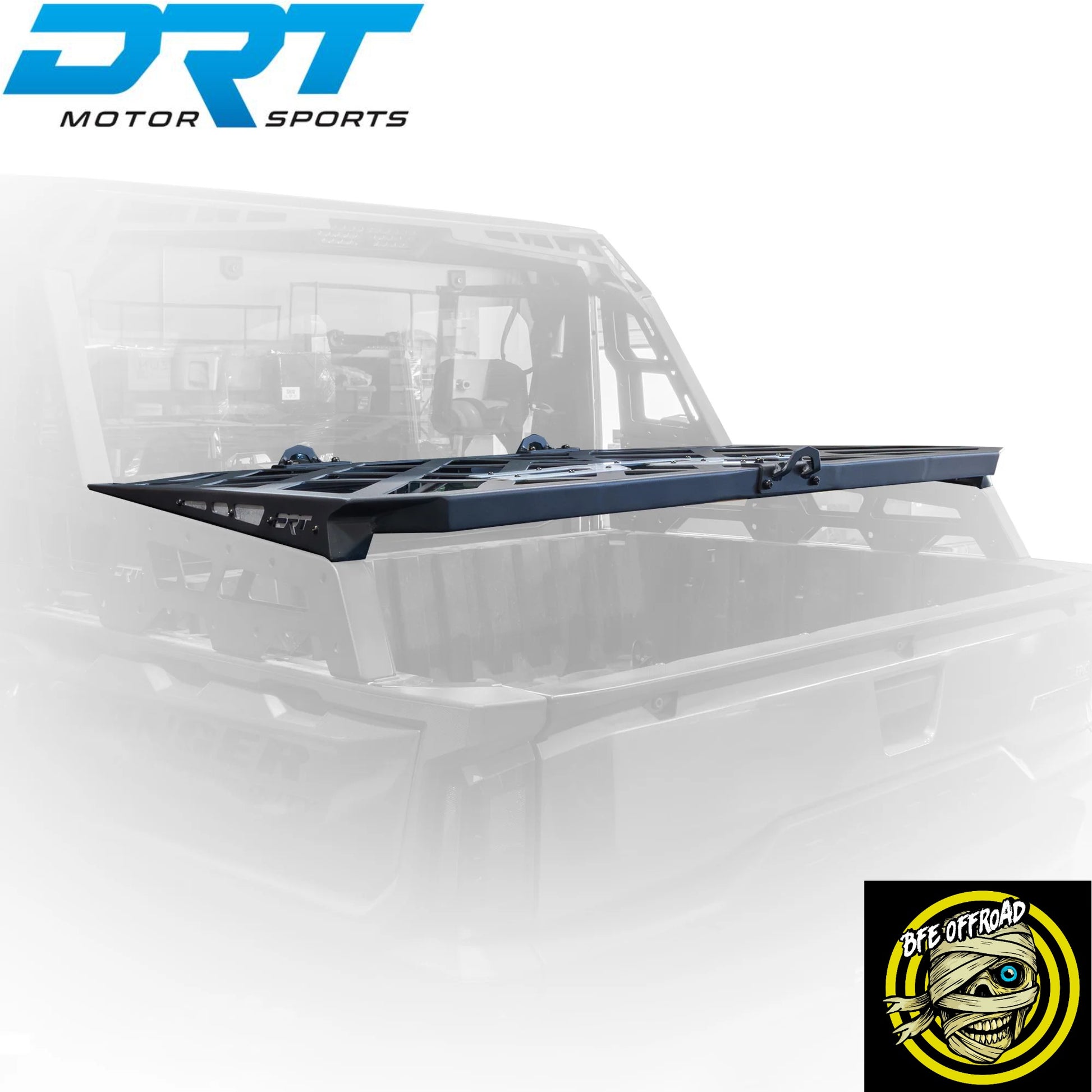 A black metal roof rack crossbar system shown mounted over the bed of a white UTV, with a faded background and DRT Motor Sports branding in the top left and a BFE Offroad Logo in the bottom right.