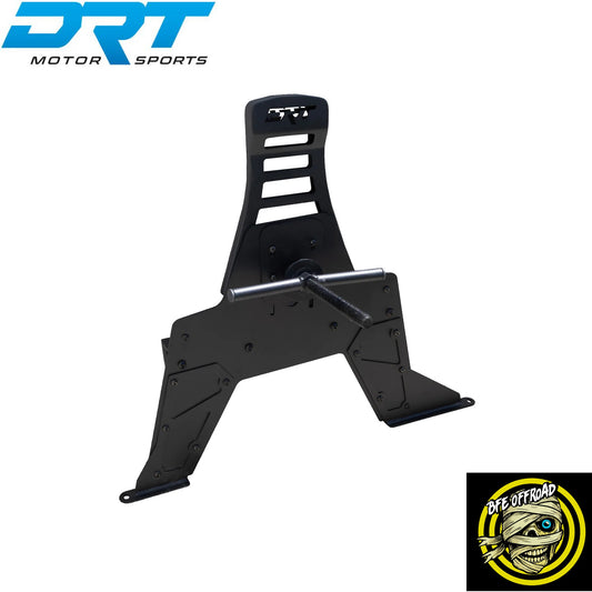 A black metal off-road vehicle part, likely a mounting bracket or chassis component, shown on a white background with DRT Motor Sports branding in the top-left and an BFE Offroad logo in the bottom-right.