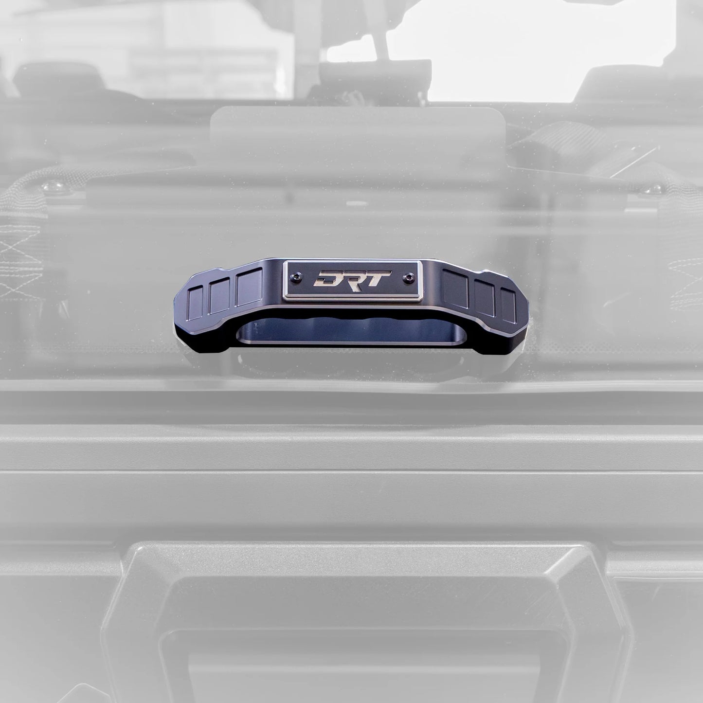 Metallic handle with 'JRT' branding on a transparent background