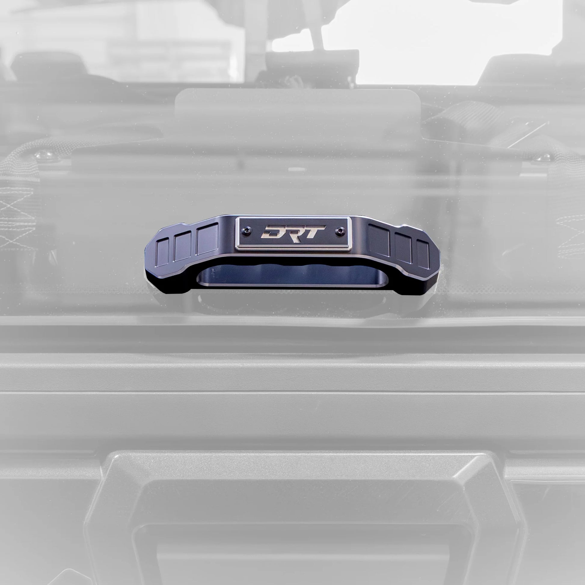 Metallic handle with 'JRT' branding on a transparent background