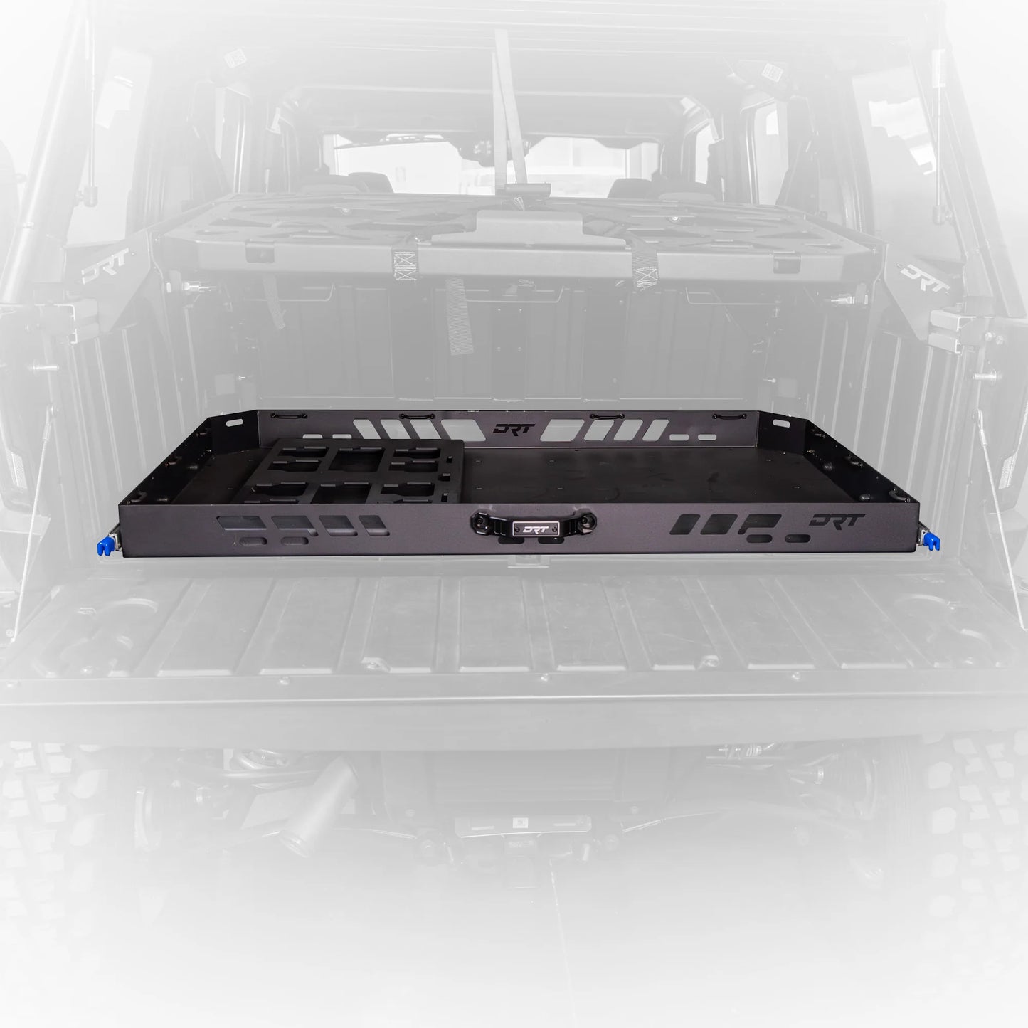 Black metal shelf or rack inside a vehicle with visible branding on a white background