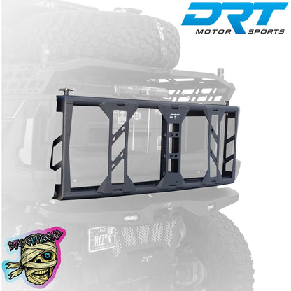 A black metal rear bumper guard rack mounted on the rear of an off-road vehicle, shown against a faded vehicle background. The DRT Motor Sports logo appears in the top right, and a BFE Offroad Logo appears in the bottom left.