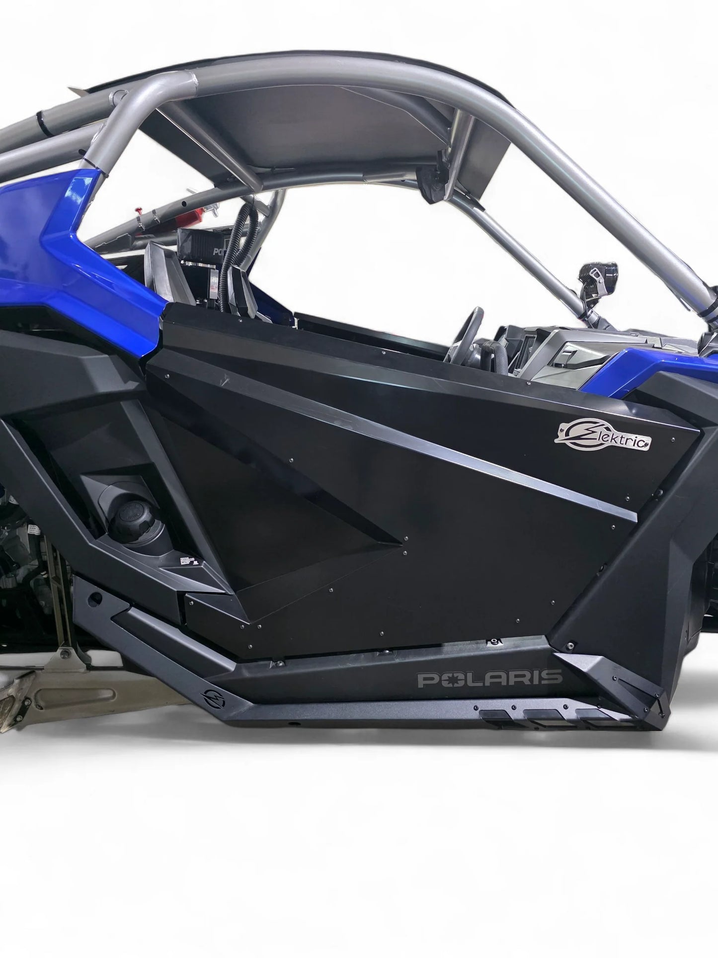 Side view of a Polaris vehicle with blue and black design on a white background