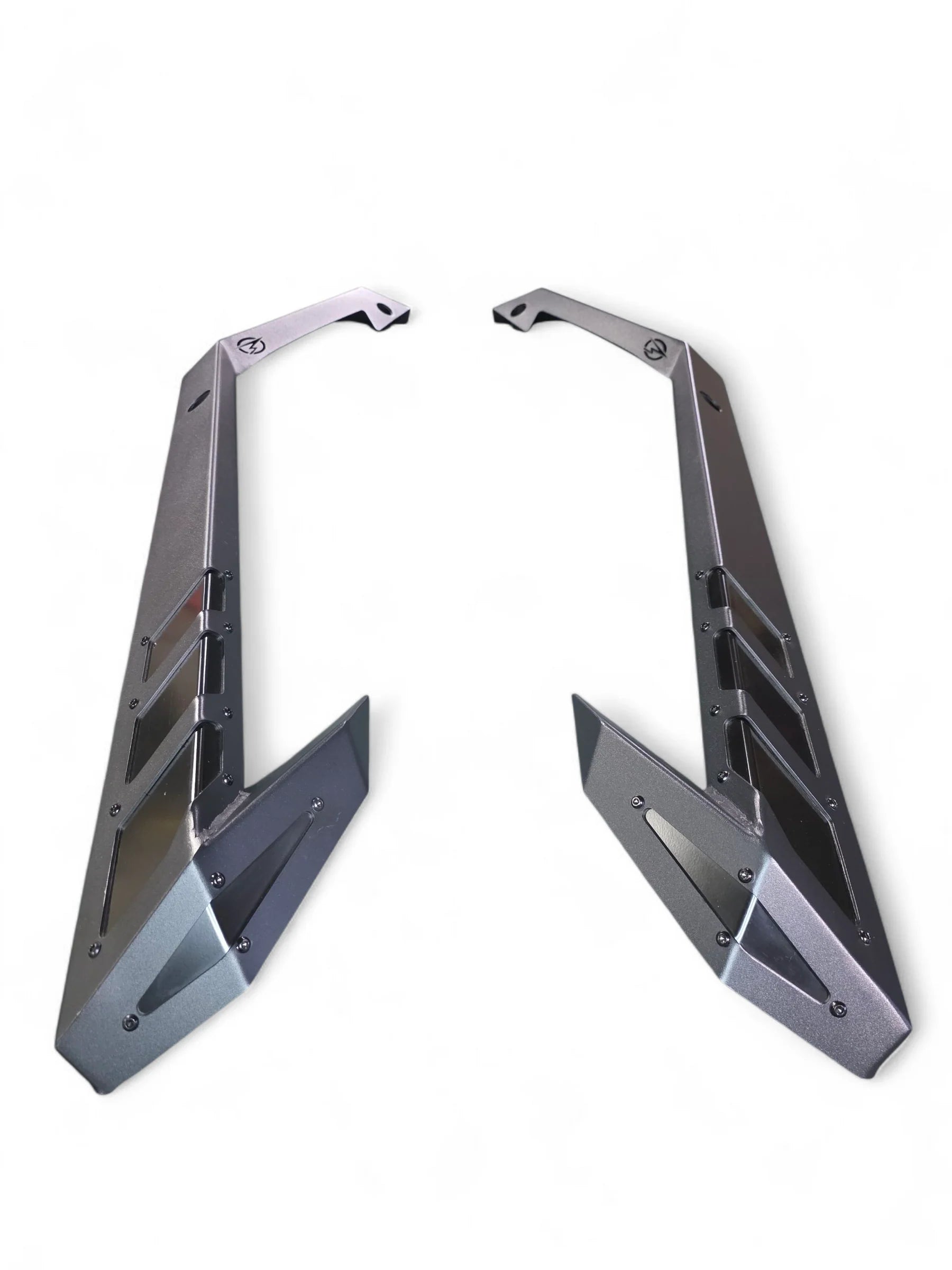 Metallic car fender and winglet on a white background