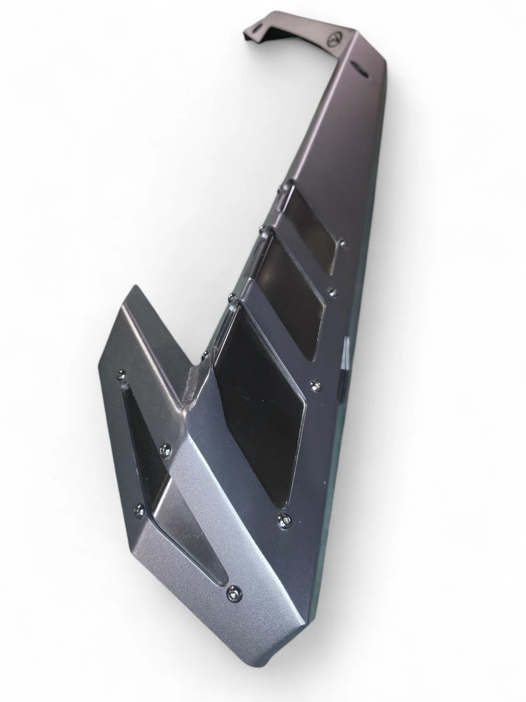 Metallic geometric object on a white background