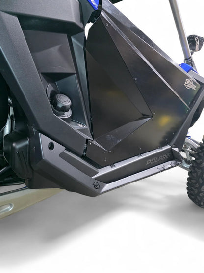 Close-up of a Polaris vehicle with a black protective cover on a white background