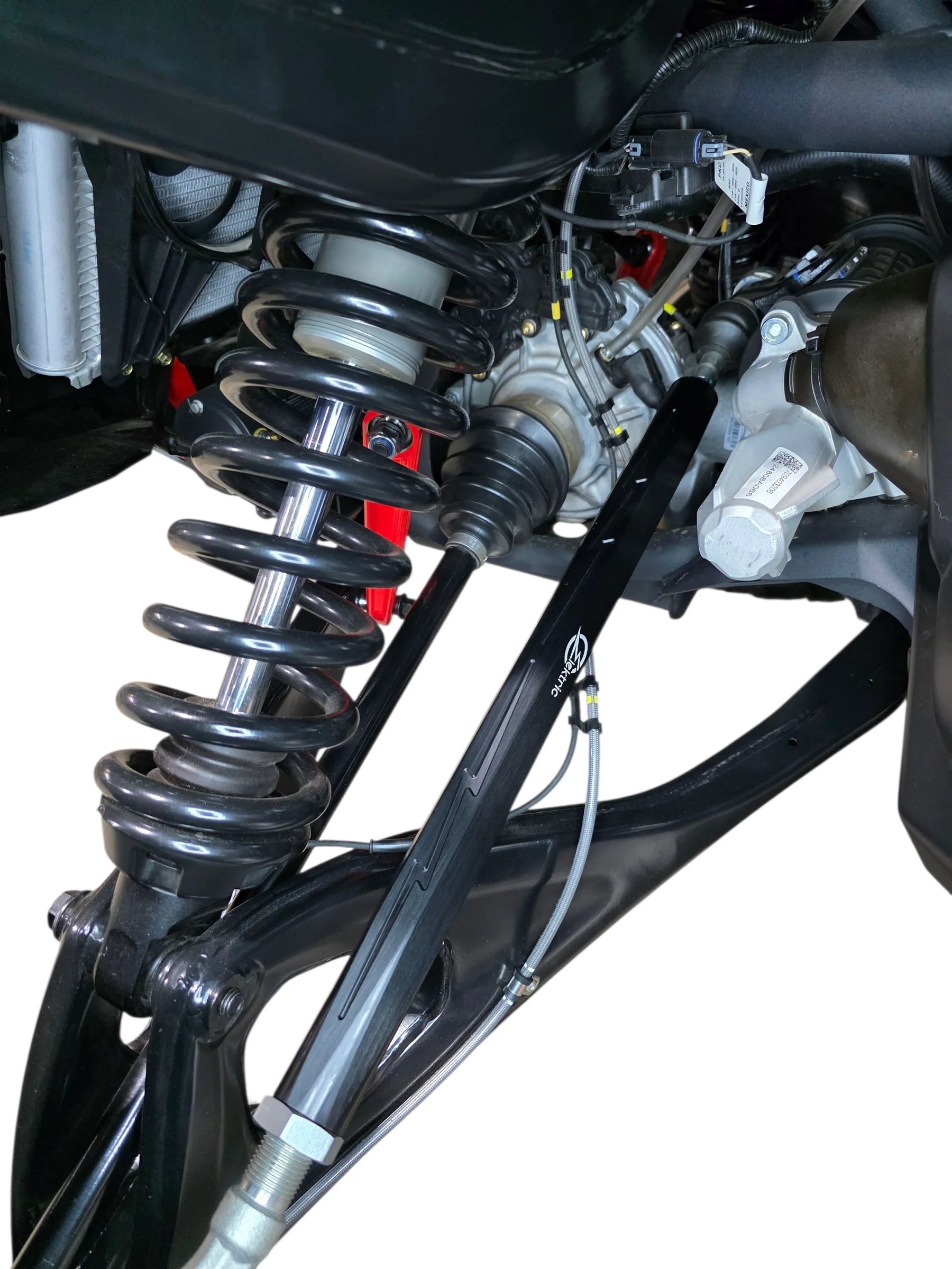 Close-up of a motorcycle suspension system on a white background