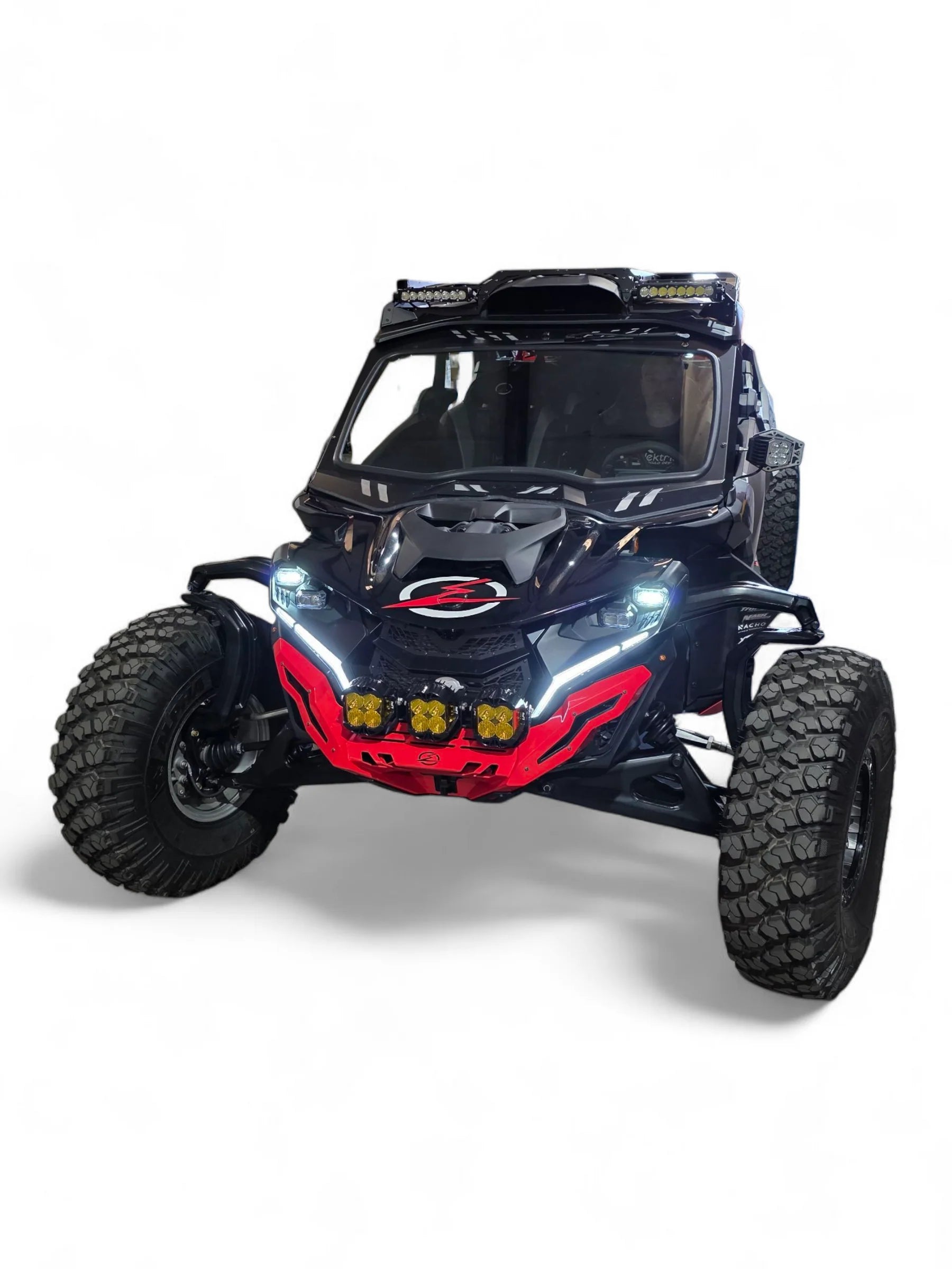 Black off-road vehicle with red accents on a white background
