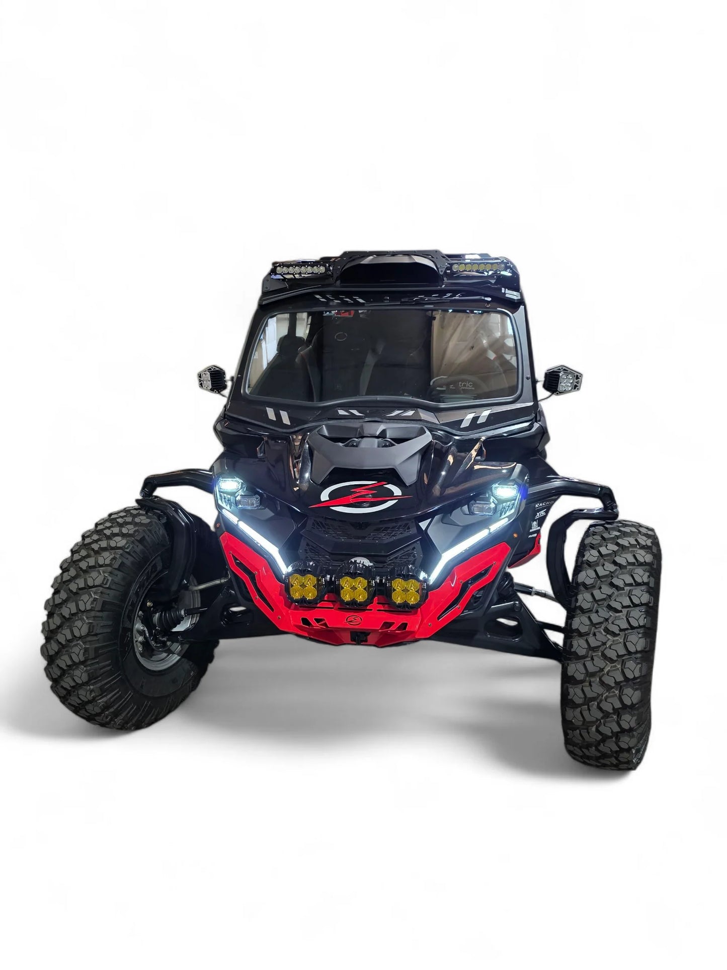 Black off-road vehicle with red accents on a white background