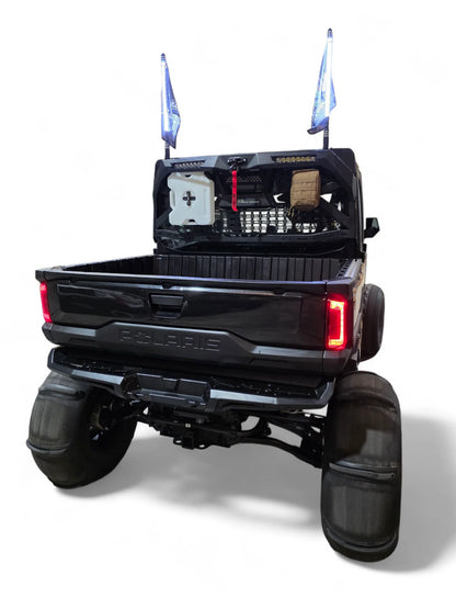 Black off-road truck with large tires on a white background