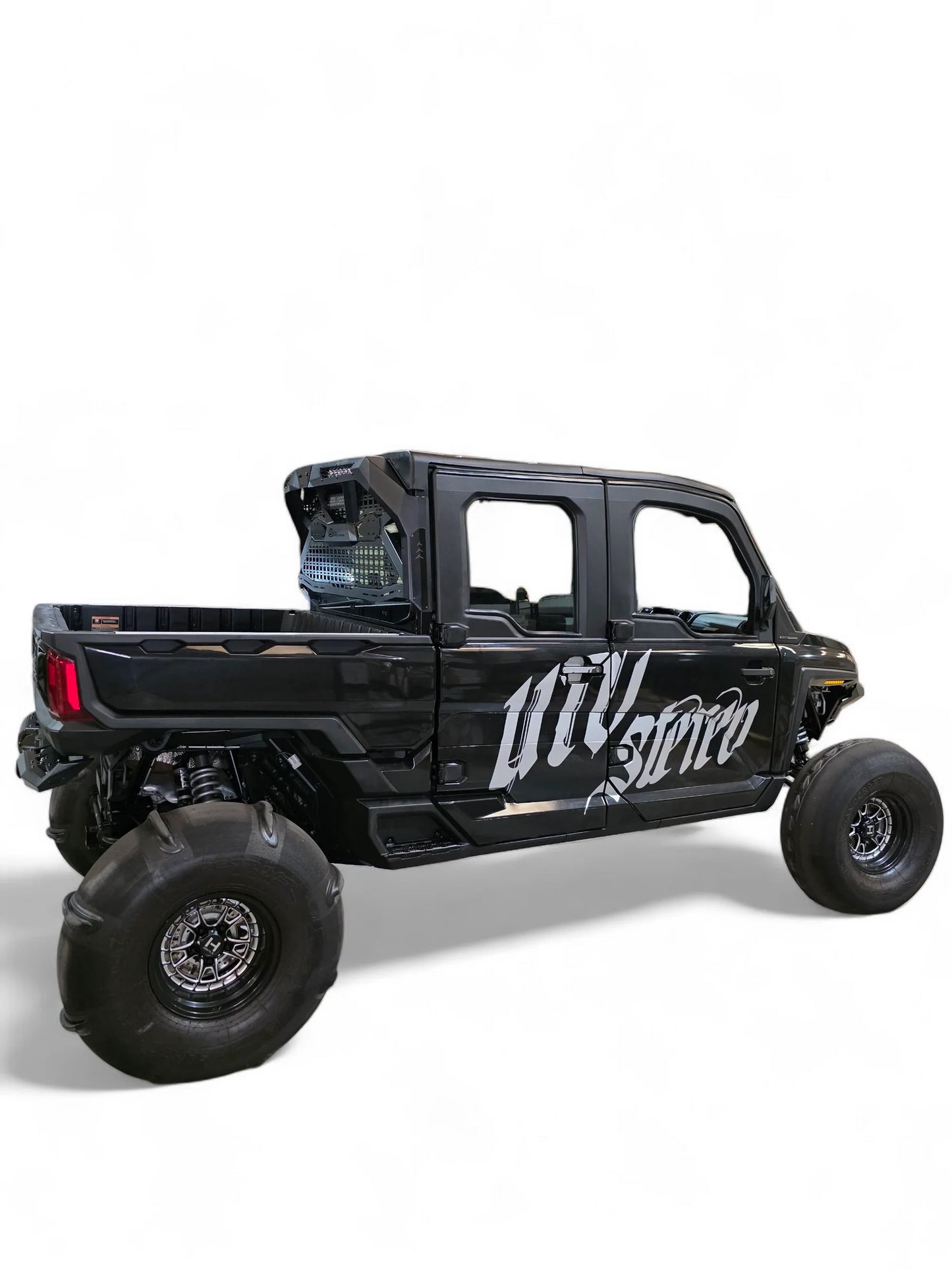 Black off-road vehicle with 'UTV Stereo' branding on a white background