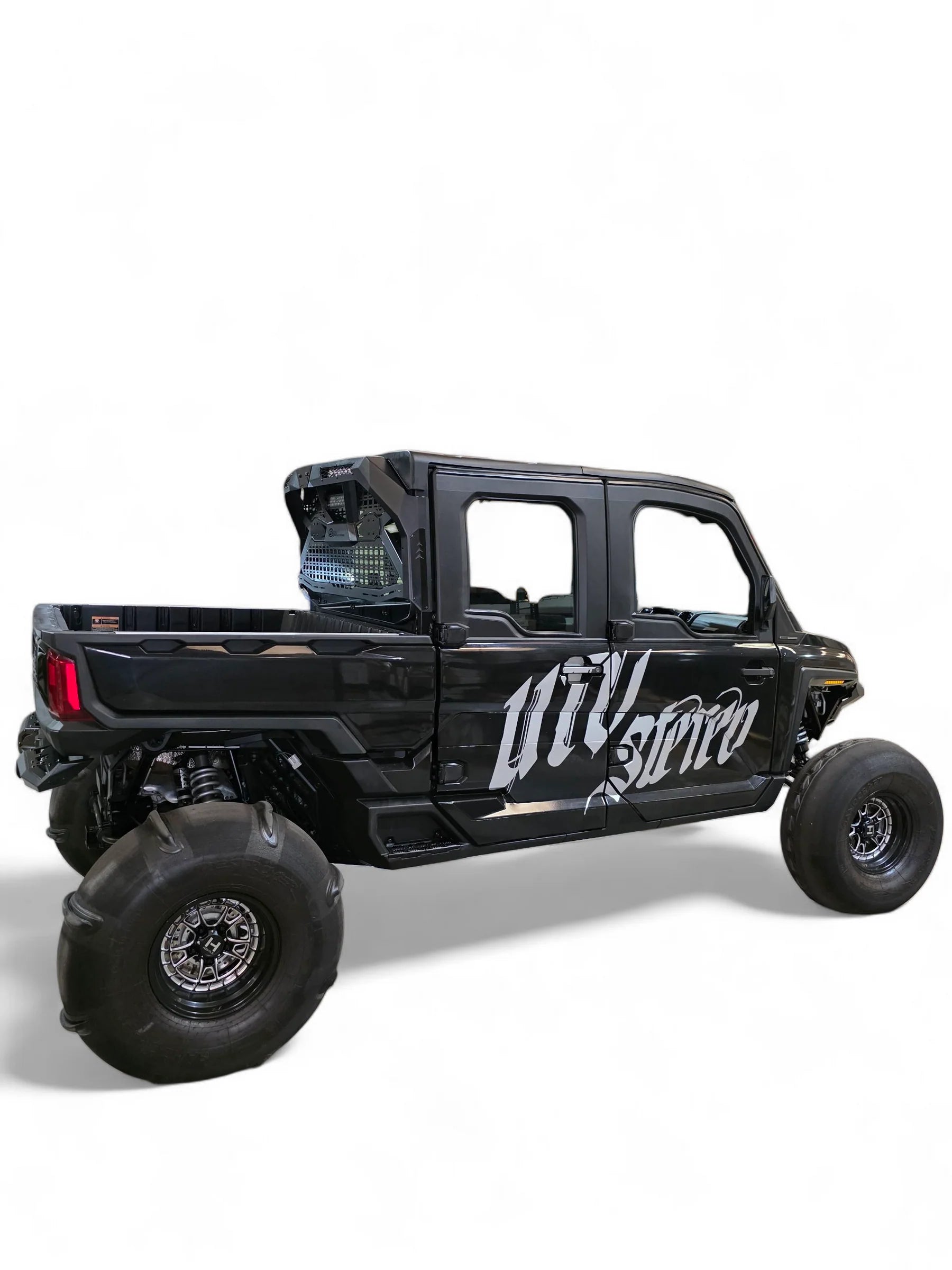 Black off-road vehicle with 'UTV Stereo' branding on a white background