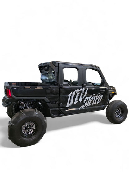 Black off-road vehicle with 'UTV Stereo' branding on a white background