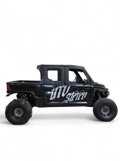 Black off-road vehicle with 'UTV Stereo' branding on a white background