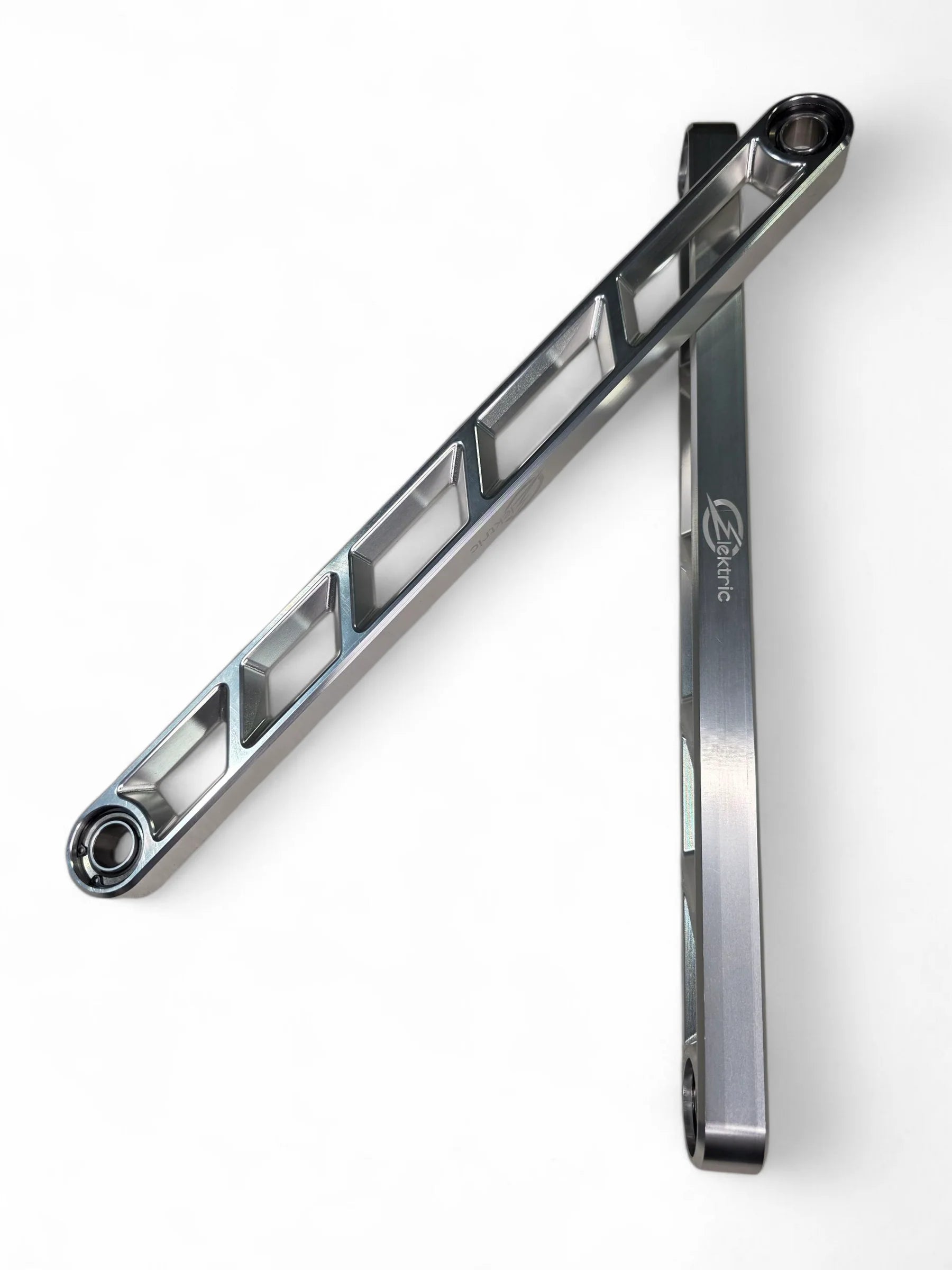Metallic tool or component on a white background