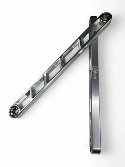 Metallic tool or component on a white background