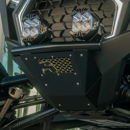 Close-up of a vehicle's front lights with a detailed grille design.