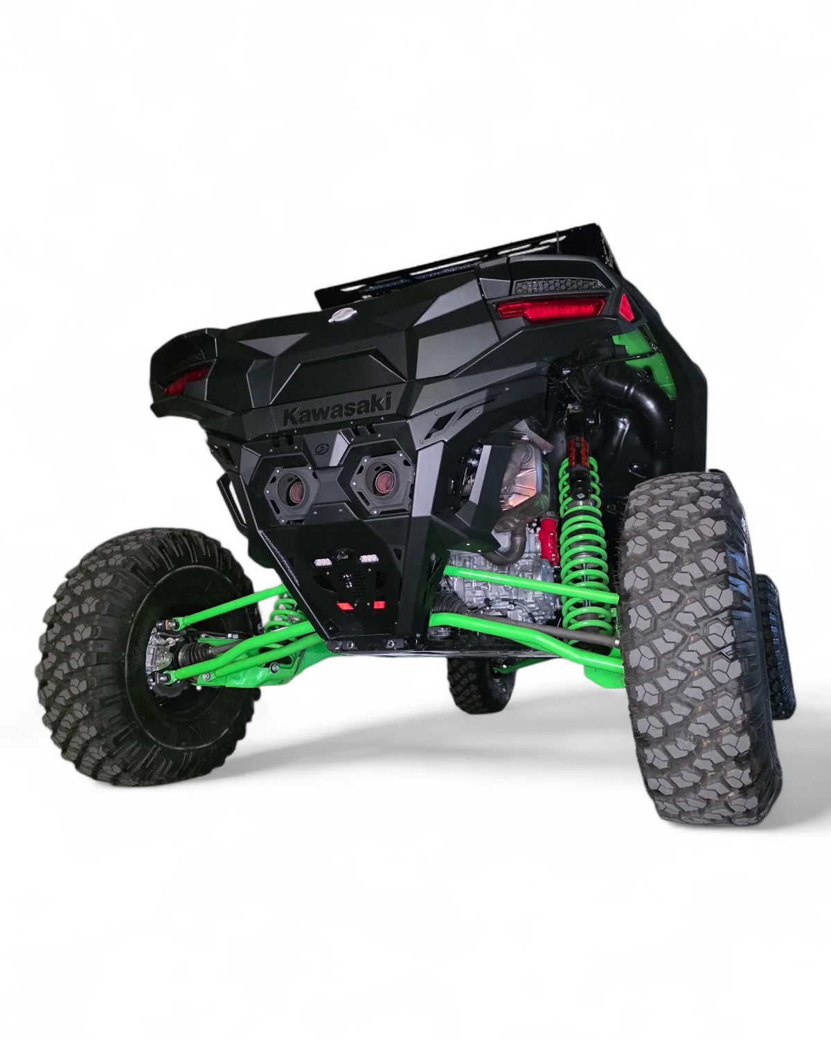 Side rear view of UTV on white background