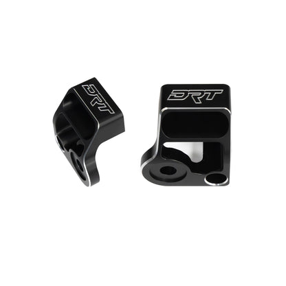 Two black metal components with 'DRT' branding on a white background