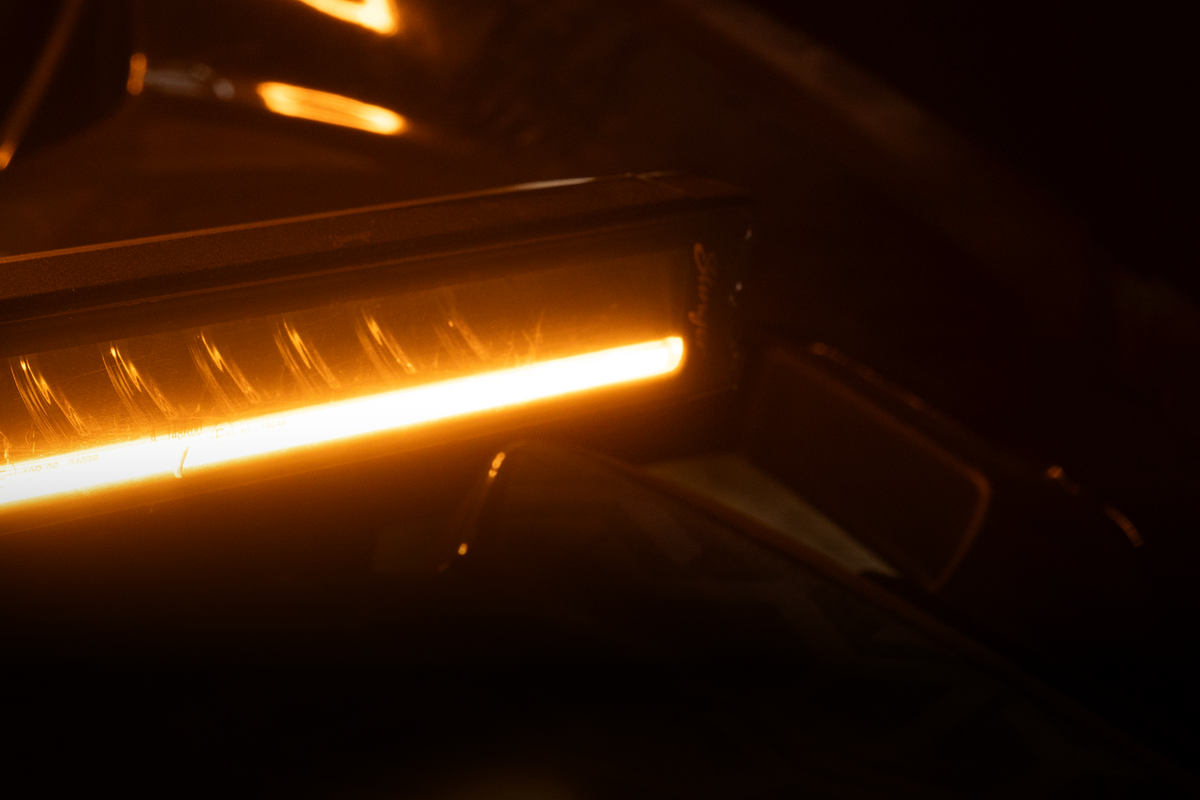 Stinger LED light bar glowing amber in the dark