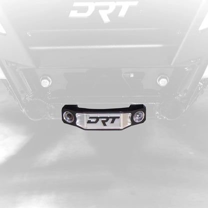 Close-up of a metallic surface with 'DRT' branding.